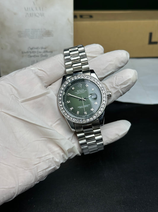 Silver Rolex Dark Green Dial